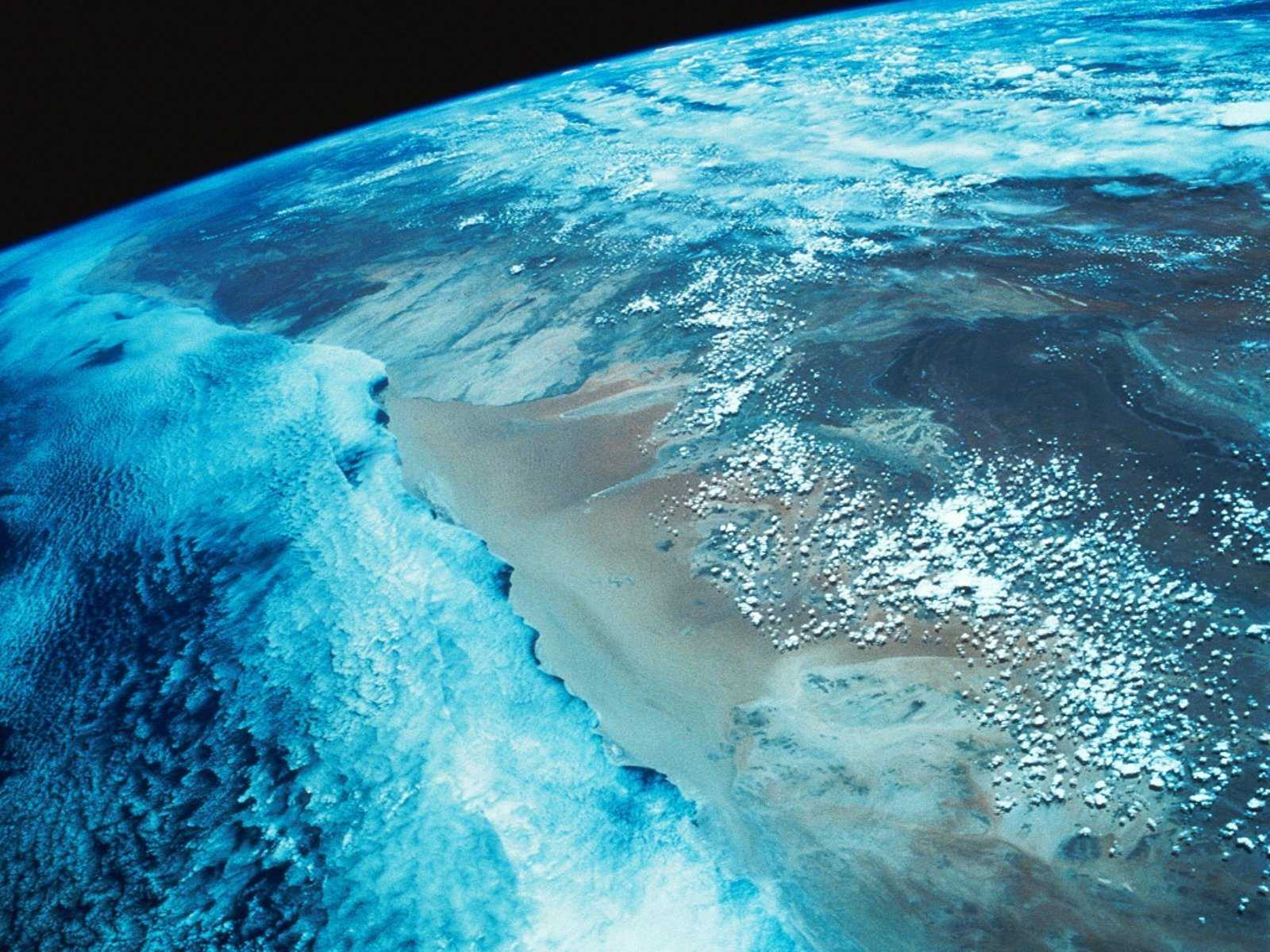 Когда на земле появился мировой океан. Вид земли из космоса. Тихий океан вид из космоса. Индийский океан из космоса. О земле и космосе.